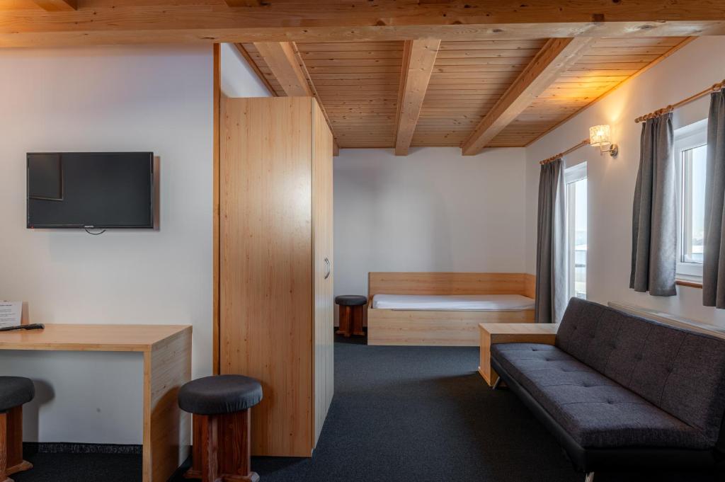 TV a/nebo společenská místnost v ubytování Hotel House Rozka