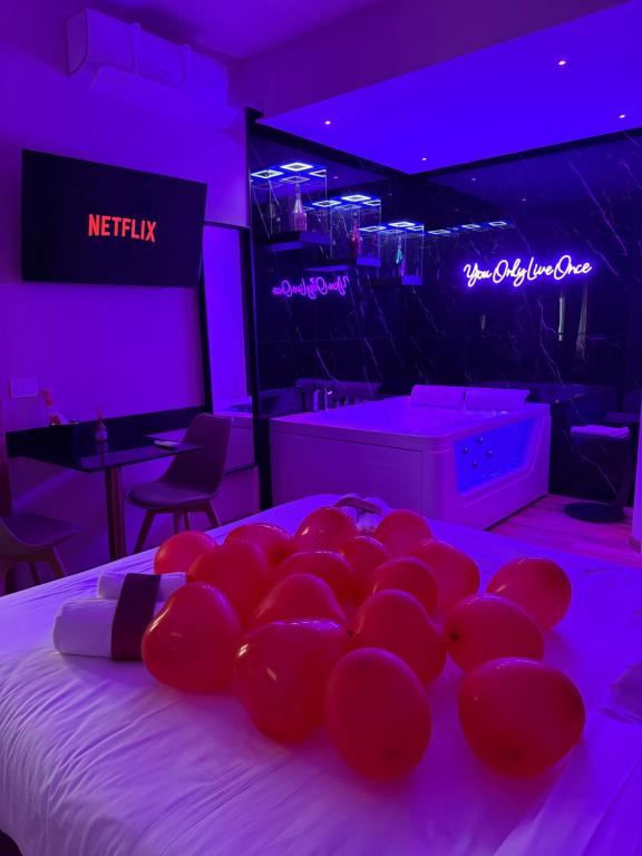 TV a/nebo společenská místnost v ubytování Raffaelli Suite