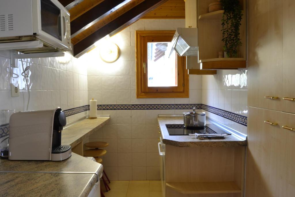 Kuchyň nebo kuchyňský kout v ubytování Misalas, Ski y montaña petfriendly - Arafita Apartamentos
