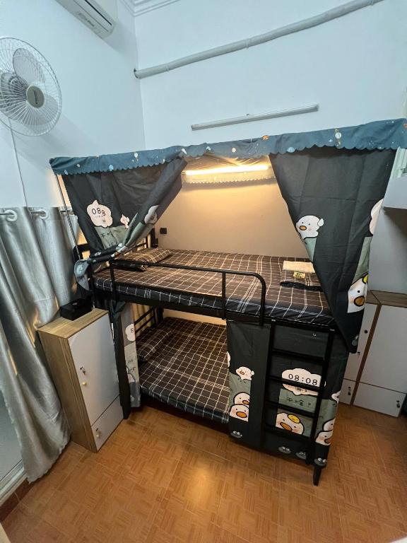 Postel nebo postele na pokoji v ubytování Hanoifriends