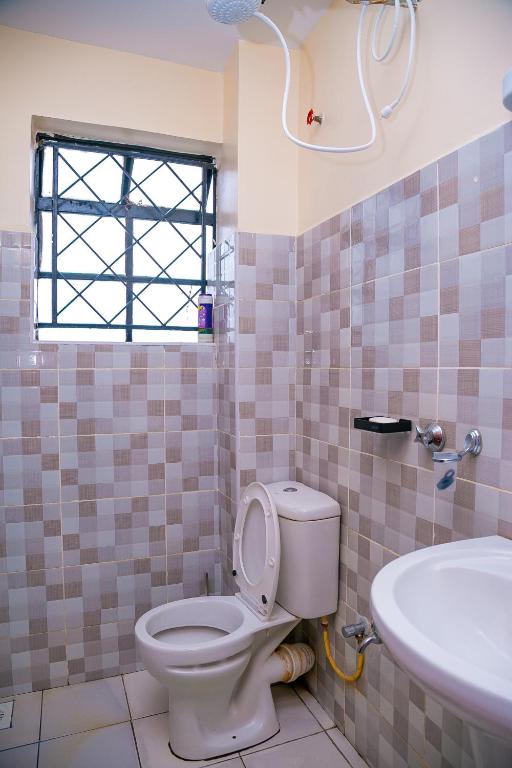 Koupelna v ubytování Dreamy Abode 1BR Kisumu