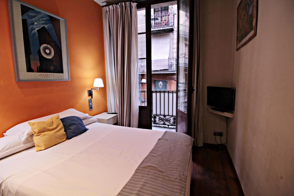Postel nebo postele na pokoji v ubytování Hotel Annex - Rey Don Jaime I