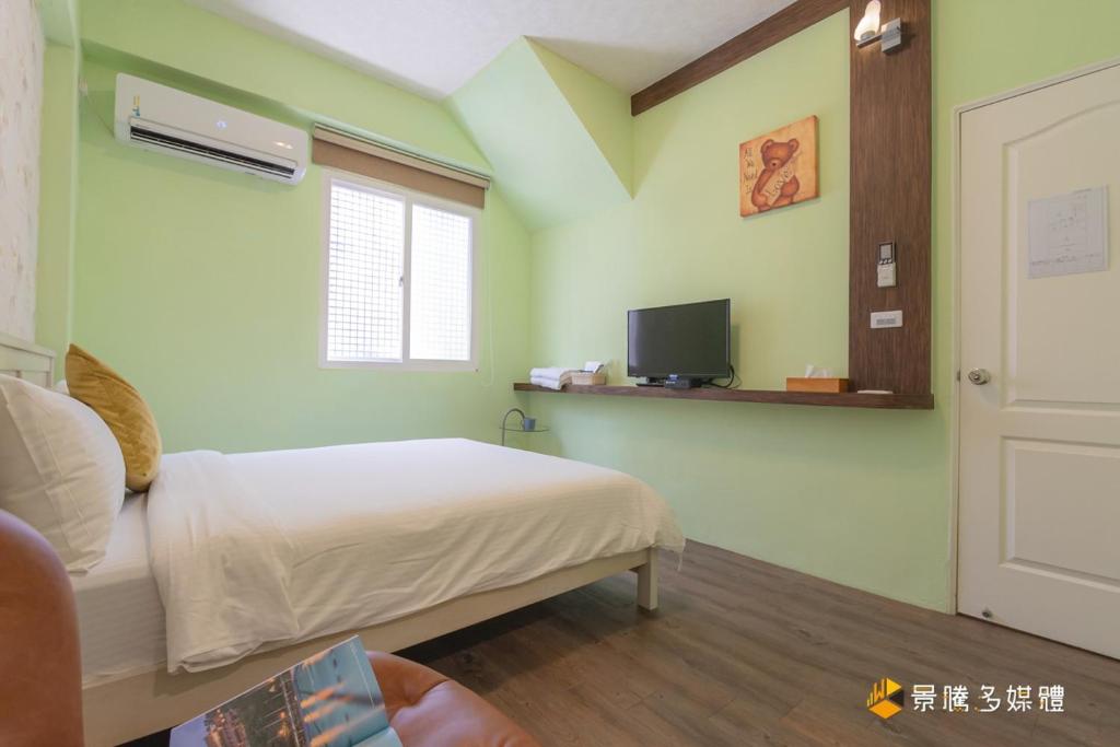 TV a/nebo společenská místnost v ubytování Janice's Inn