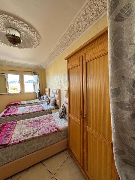 Postel nebo postele na pokoji v ubytování Dar bennis 2