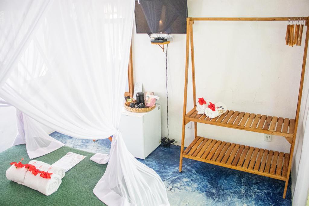 Postel nebo postele na pokoji v ubytování POUSADA CARMELITHA