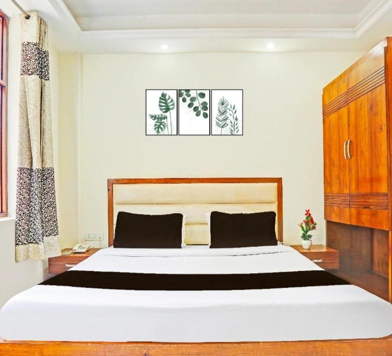 Giường trong phòng chung tại SMS GRAND inn