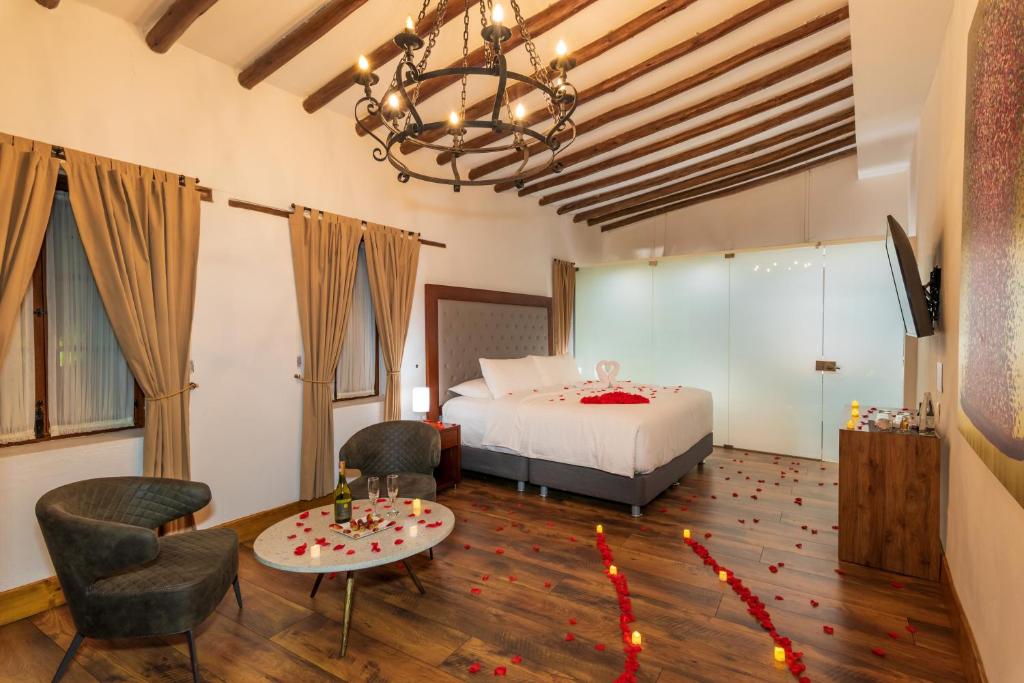 Postel nebo postele na pokoji v ubytování Hotel Boutique MR