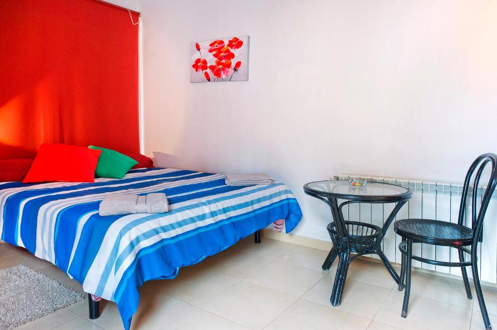 Postel nebo postele na pokoji v ubytování Verdaguer Home