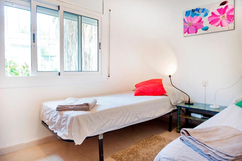 Postel nebo postele na pokoji v ubytování Verdaguer Home