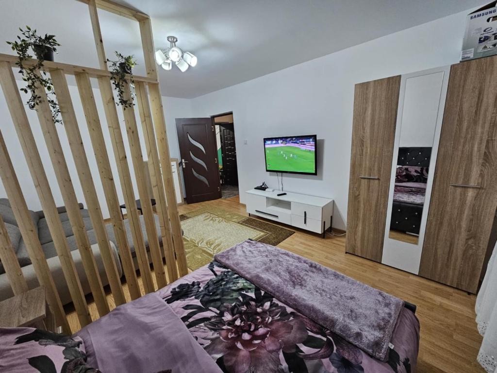 Postel nebo postele na pokoji v ubytování Bella 1 Lupeni