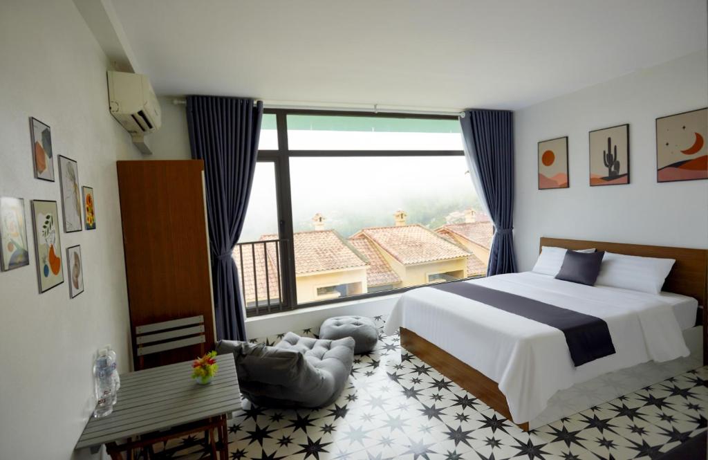 Postel nebo postele na pokoji v ubytování Sweet Apartment Sa Pa