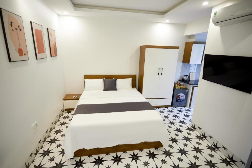 Postel nebo postele na pokoji v ubytování Sweet Apartment Sa Pa