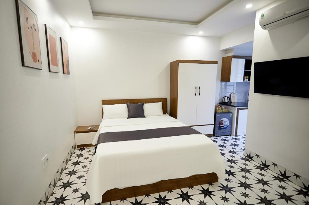 Postel nebo postele na pokoji v ubytování Sweet Apartment Sa Pa