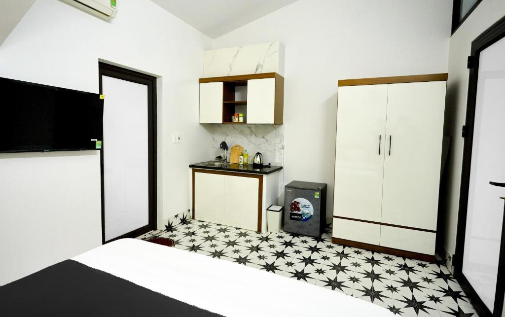 Kuchyň nebo kuchyňský kout v ubytování Sweet Apartment Sa Pa