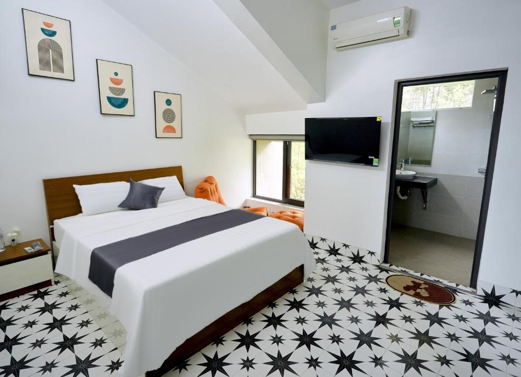 Postel nebo postele na pokoji v ubytování Sweet Apartment Sa Pa