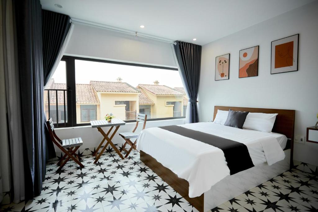 Postel nebo postele na pokoji v ubytování Sweet Apartment Sa Pa