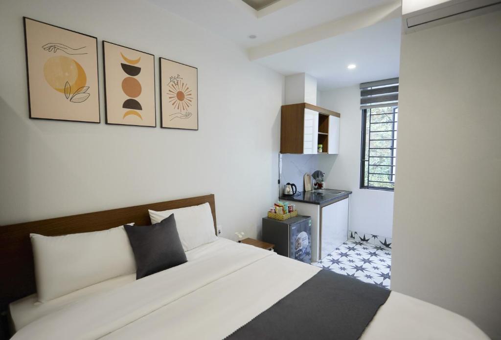 Postel nebo postele na pokoji v ubytování Sweet Apartment Sa Pa