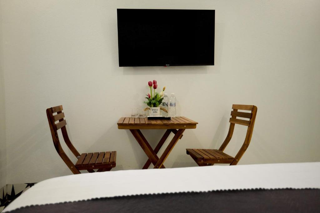 TV a/nebo společenská místnost v ubytování Sweet Apartment Sa Pa