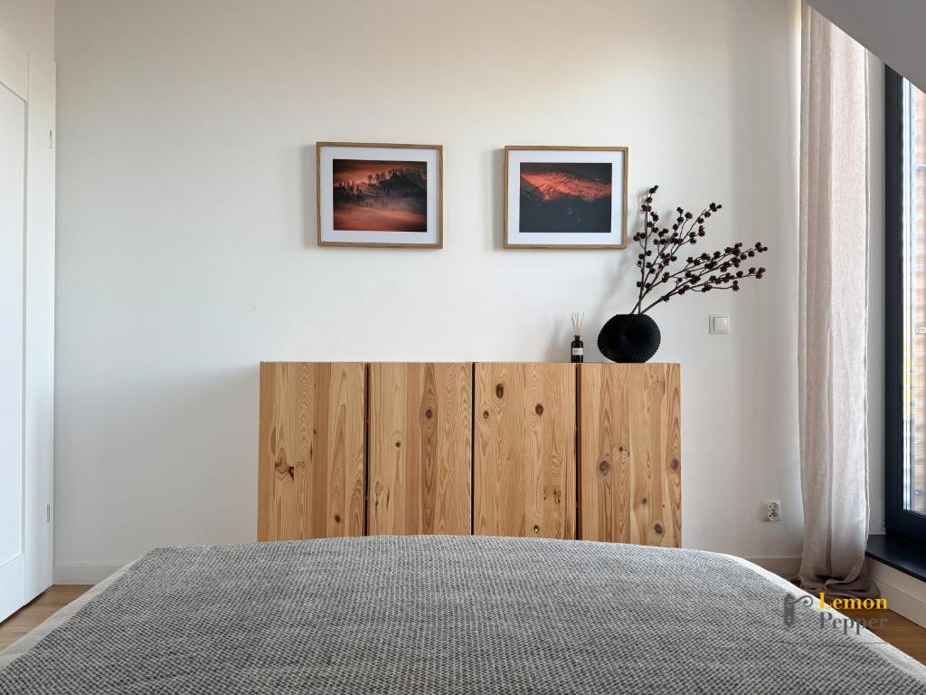 Posteľ alebo postele v izbe v ubytovaní Apartament Krzysztofa Bochusa