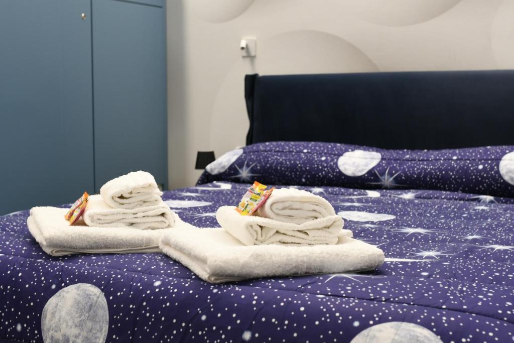 Postel nebo postele na pokoji v ubytování Pescara Blu B&B
