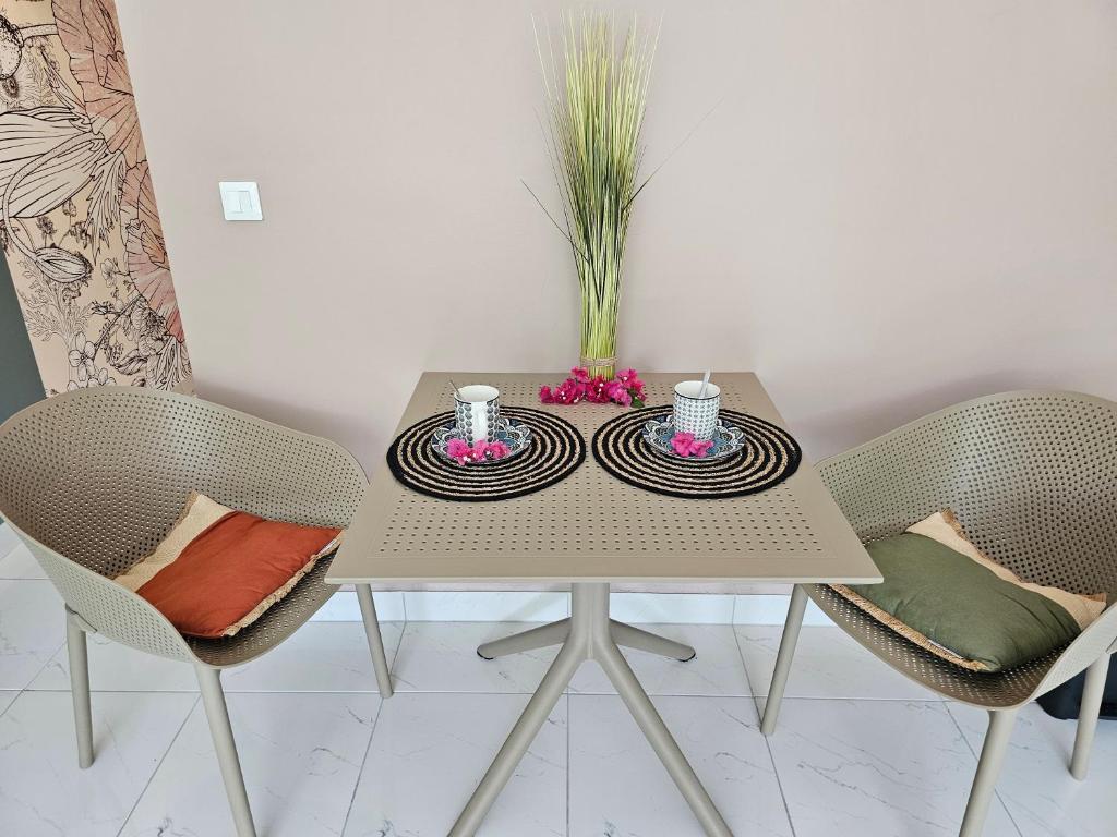 Posezení v ubytování Paradis de Kim, 1 Chambre, sur la plage, Grande Piscine