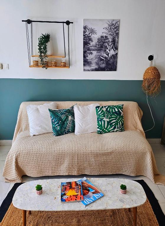 Posezení v ubytování Paradis de Kim, 1 Chambre, sur la plage, Grande Piscine
