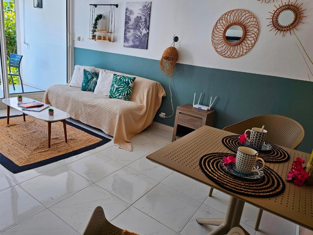 Posezení v ubytování Paradis de Kim, 1 Chambre, sur la plage, Grande Piscine