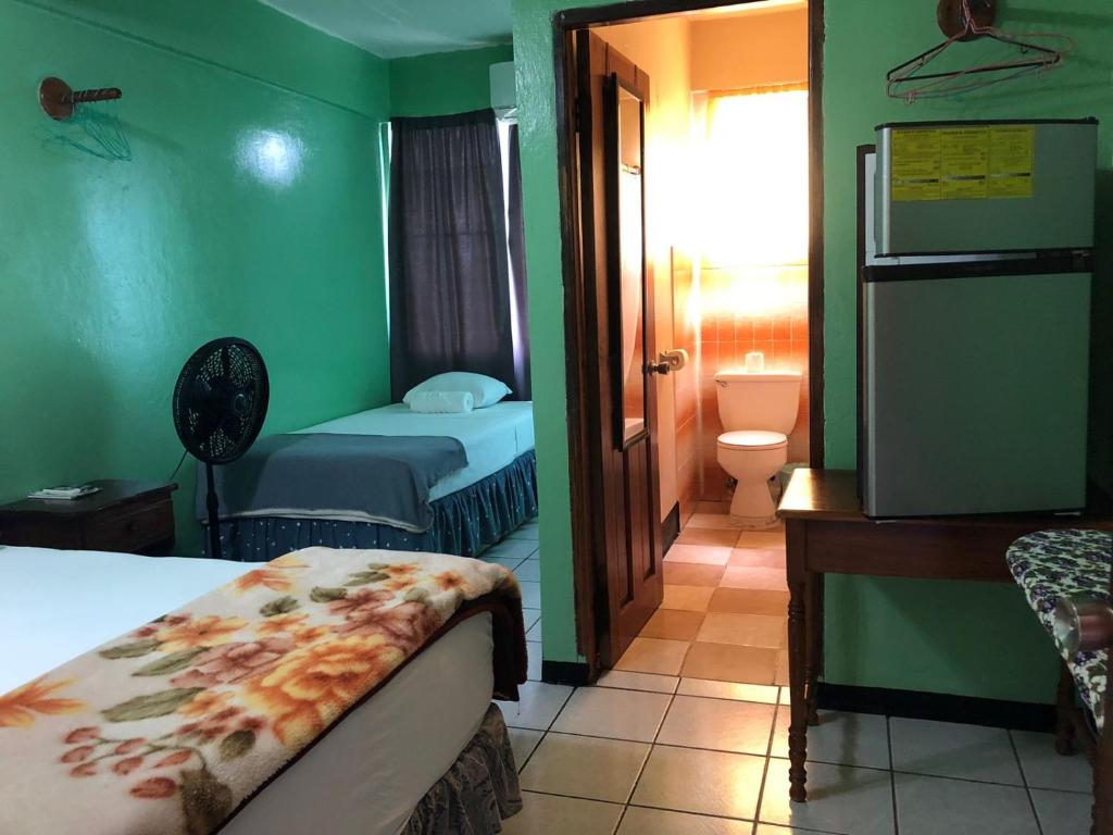 Postel nebo postele na pokoji v ubytování Chaleanor Hotel