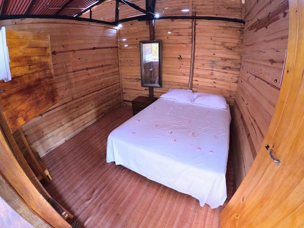 Postel nebo postele na pokoji v ubytování Eco hotel Mar De Ensueño