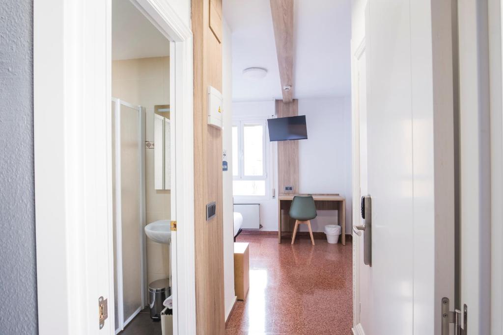 TV a/nebo společenská místnost v ubytování Residencia Zeta Home