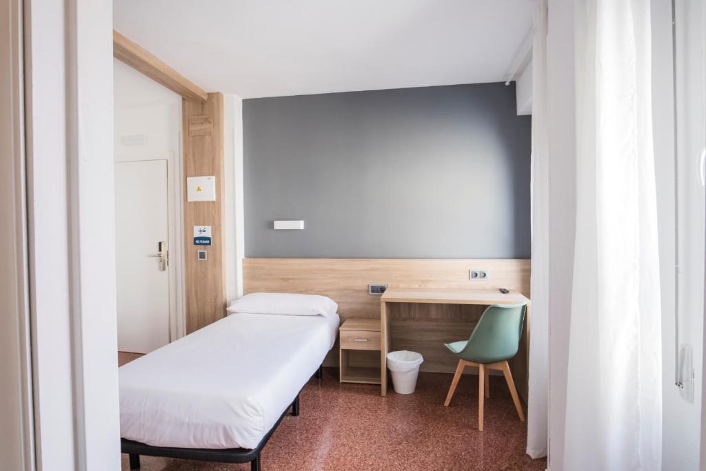 Postel nebo postele na pokoji v ubytování Residencia Zeta Home