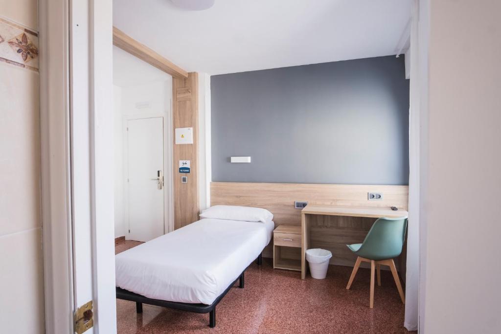 Postel nebo postele na pokoji v ubytování Residencia Zeta Home