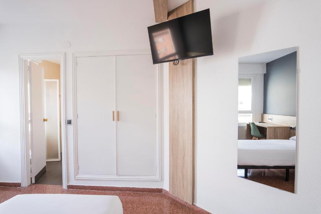 Postel nebo postele na pokoji v ubytování Residencia Zeta Home