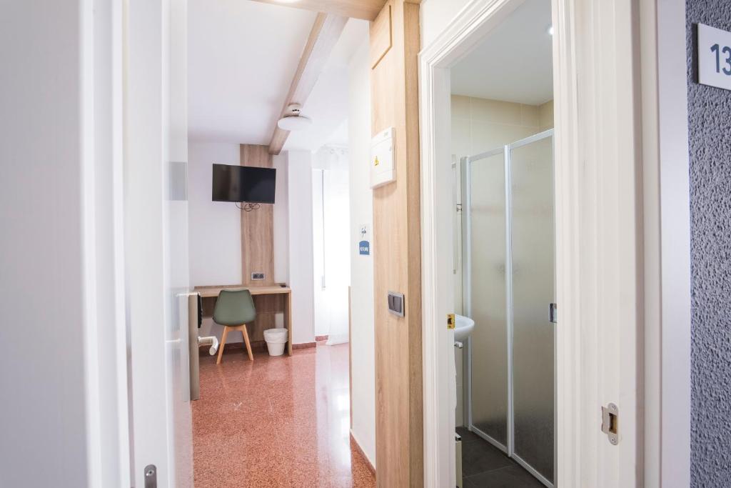TV a/nebo společenská místnost v ubytování Residencia Zeta Home