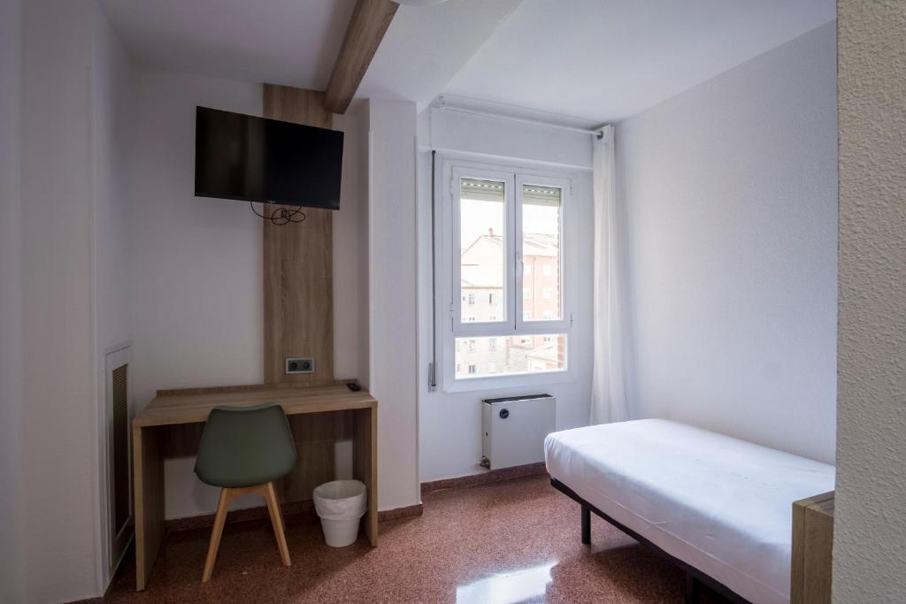 Postel nebo postele na pokoji v ubytování Residencia Zeta Home