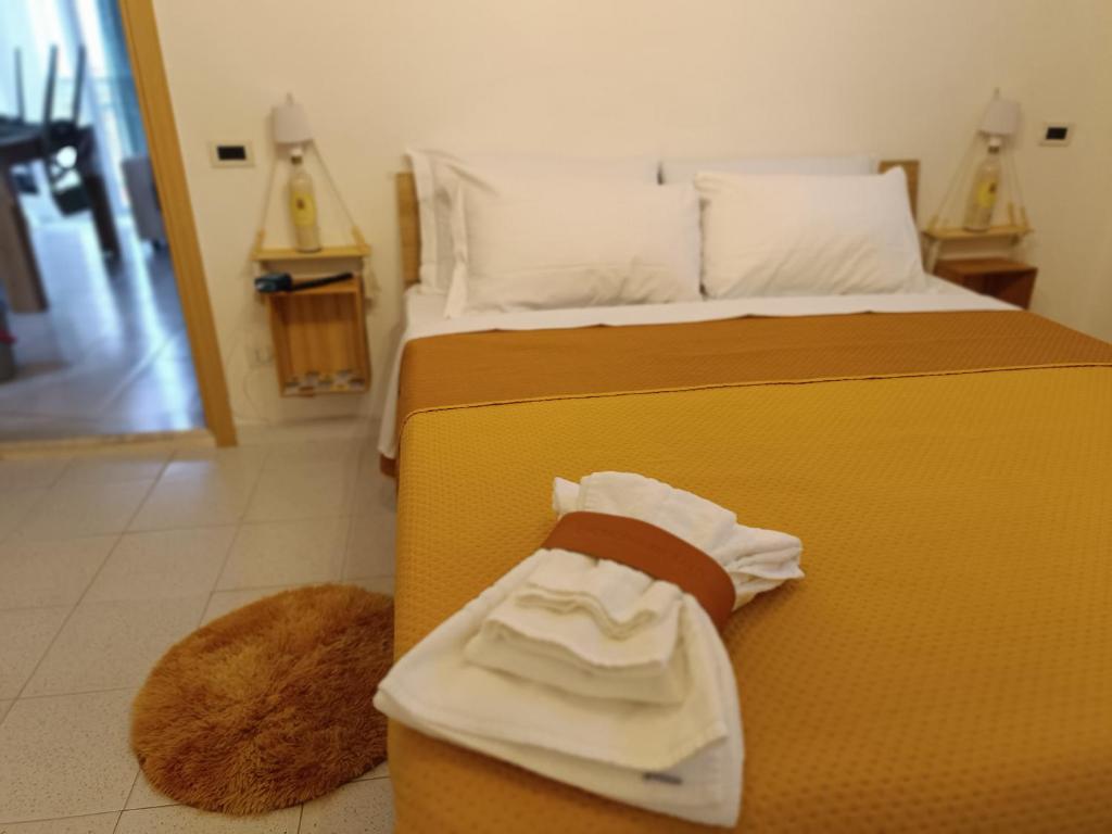 Postel nebo postele na pokoji v ubytování L'altalena sui Sassi