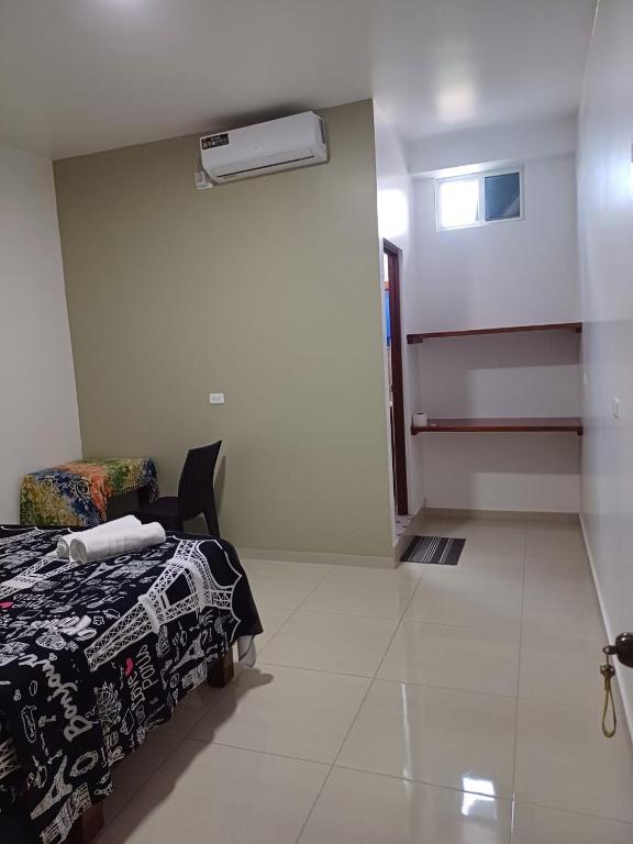 Postel nebo postele na pokoji v ubytování Casa Puka