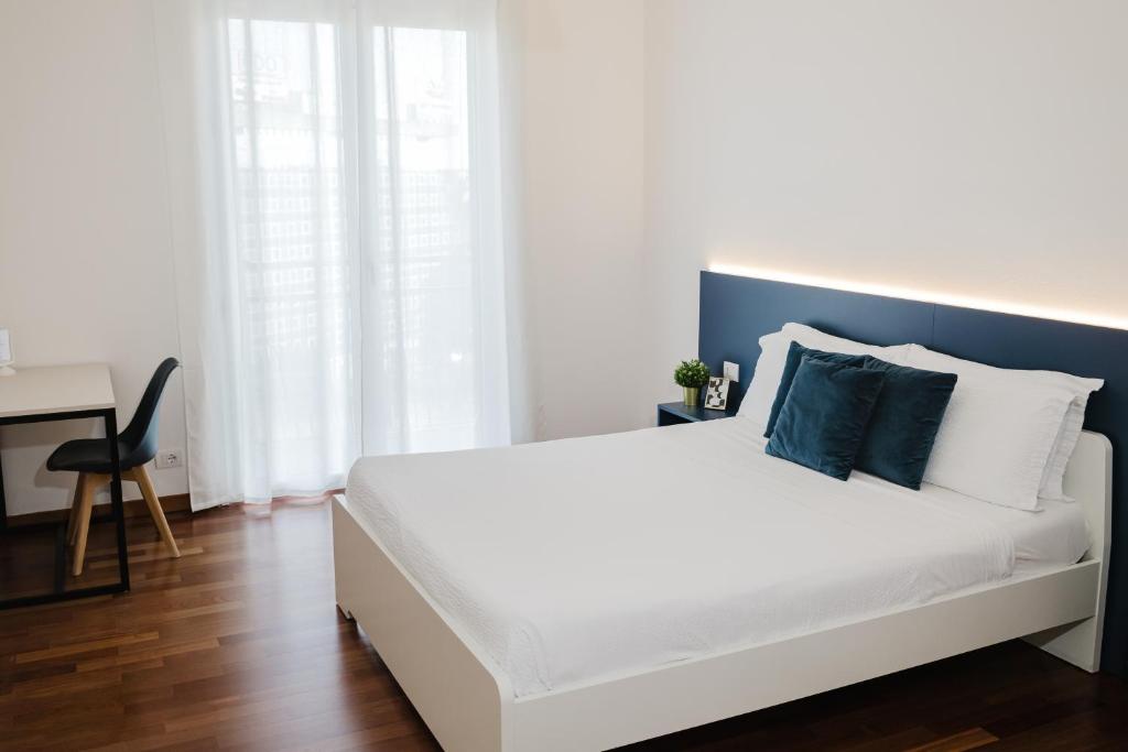Postel nebo postele na pokoji v ubytování B&B Best Hostel Milano