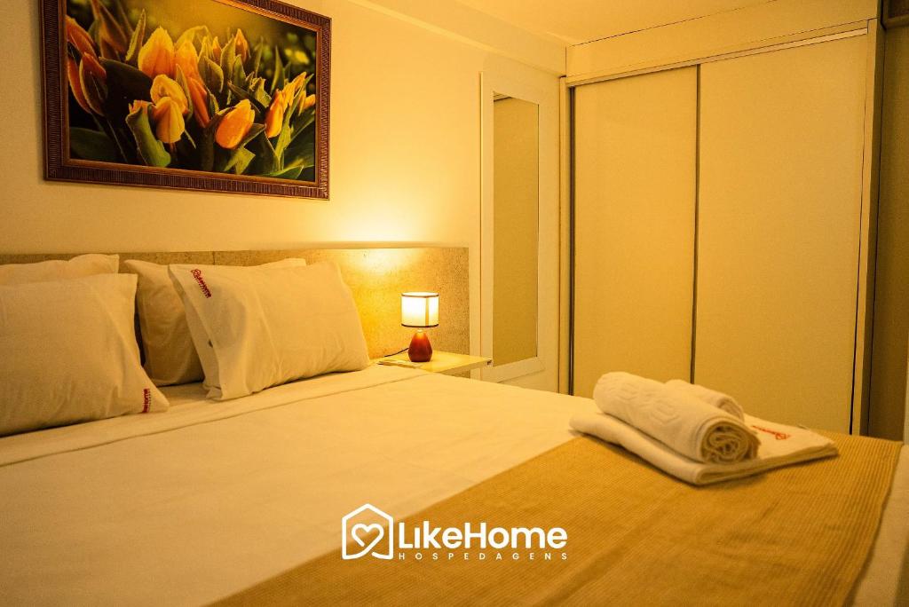 Ένα ή περισσότερα κρεβάτια σε δωμάτιο στο LikeHome/ Magnific Tambaú