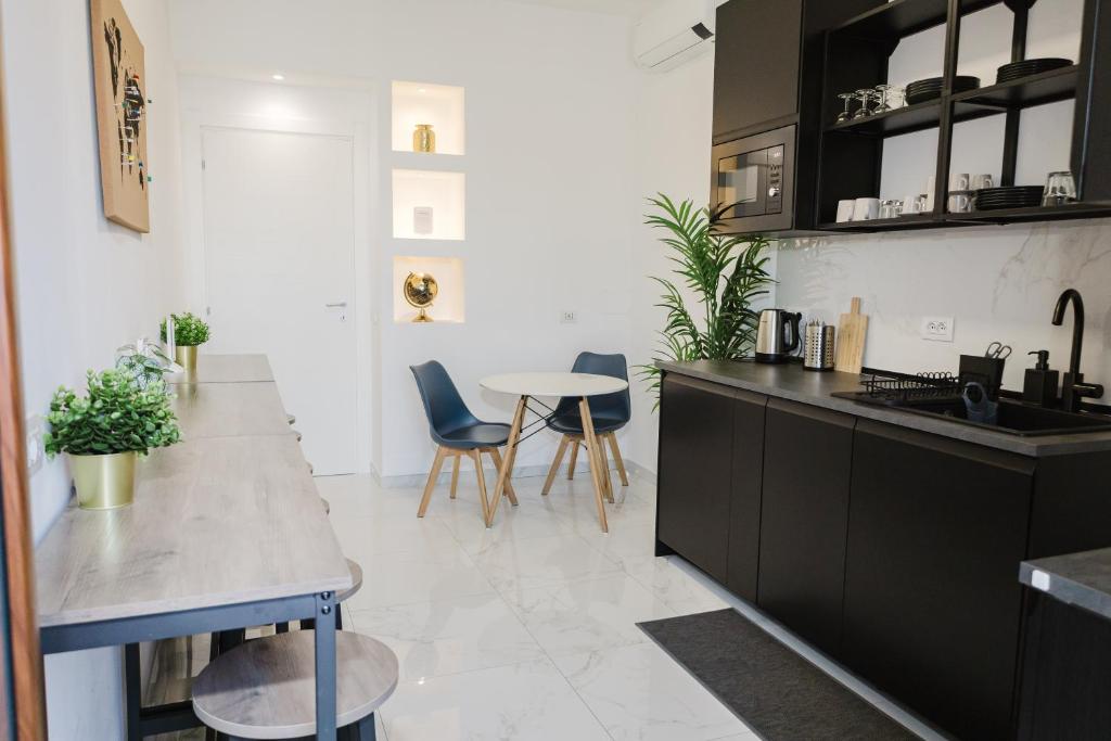 Kuchyň nebo kuchyňský kout v ubytování B&B Best Hostel Milano
