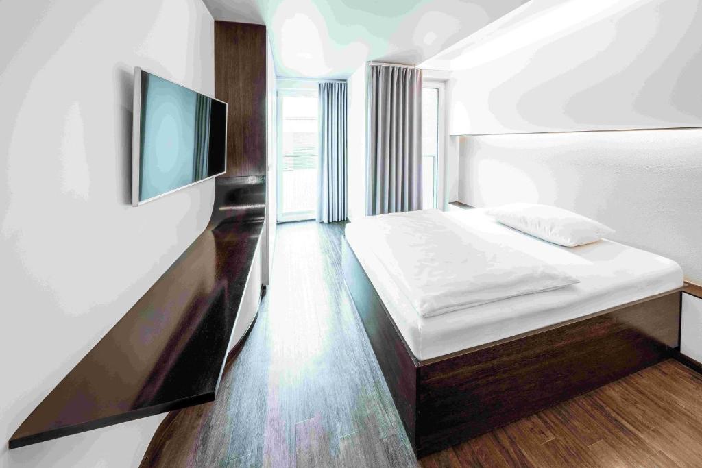 Postel nebo postele na pokoji v ubytování Hotel Q! Berlin