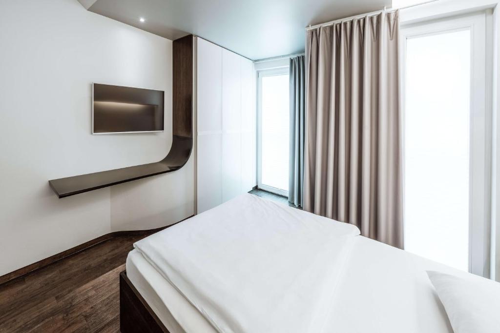 Postel nebo postele na pokoji v ubytování Hotel Q! Berlin