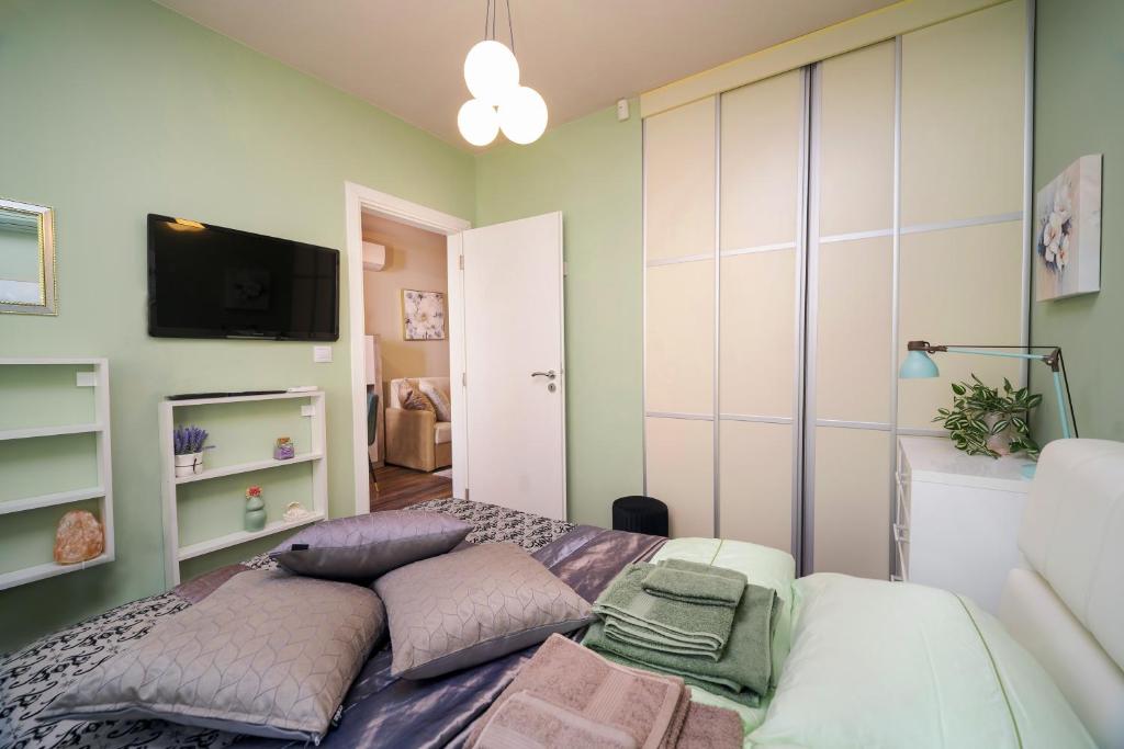Postel nebo postele na pokoji v ubytování Bright Inn - Holiday & Business Apartment