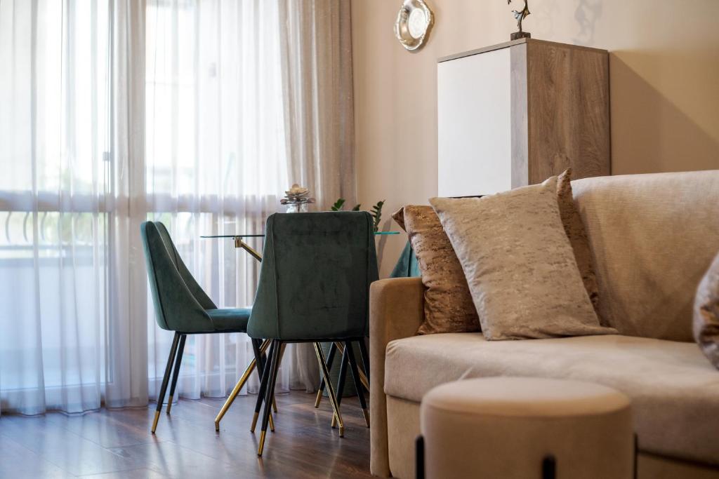Posezení v ubytování Bright Inn - Holiday & Business Apartment