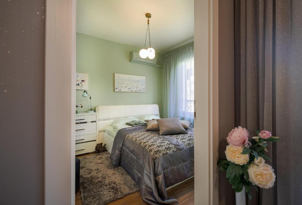 Postel nebo postele na pokoji v ubytování Bright Inn - Holiday & Business Apartment