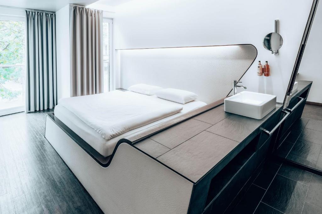 Postel nebo postele na pokoji v ubytování Hotel Q! Berlin