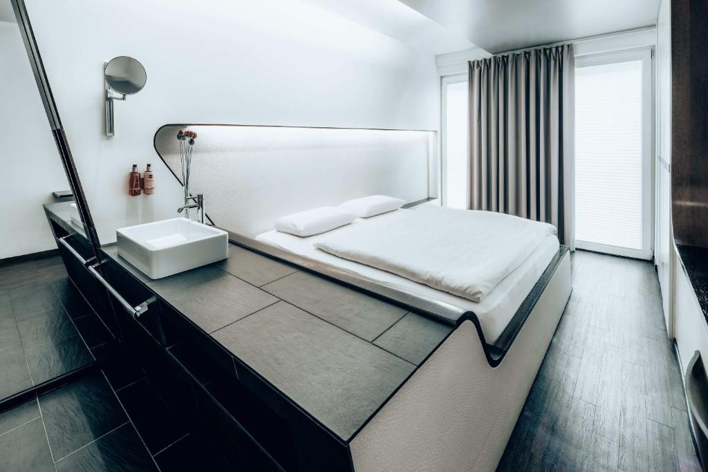 Postel nebo postele na pokoji v ubytování Hotel Q! Berlin