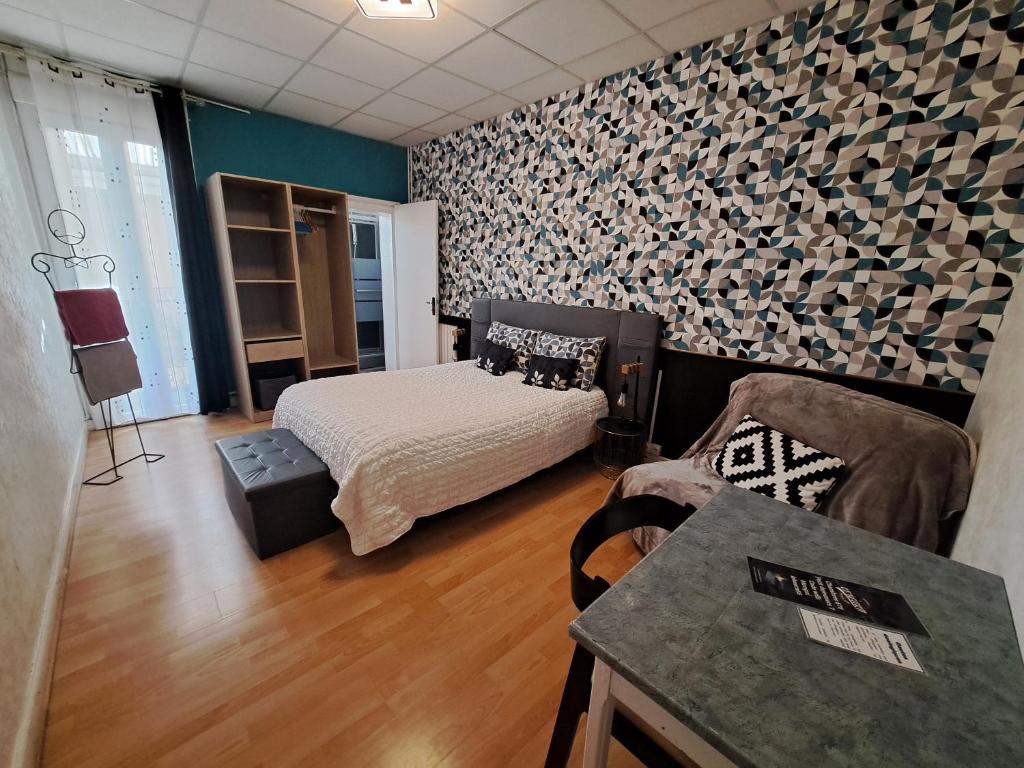 Postel nebo postele na pokoji v ubytování hôtel le Béarn