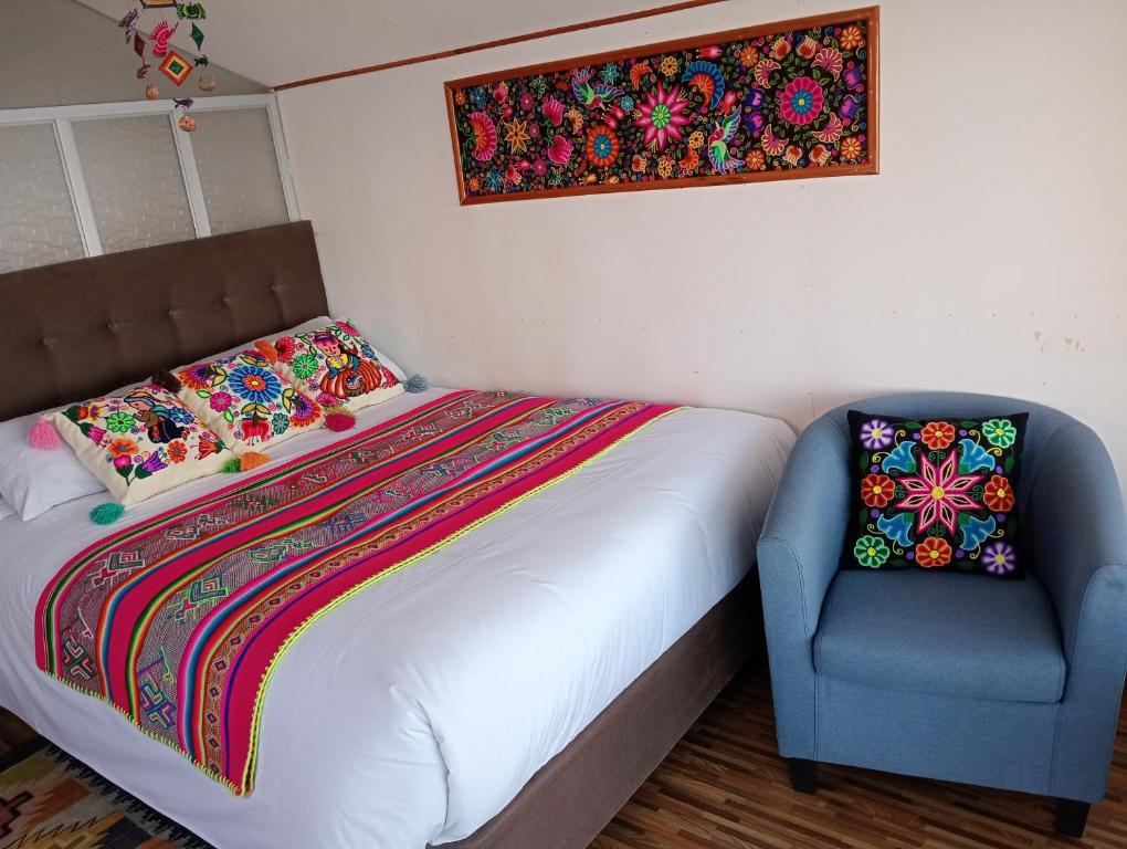 Postel nebo postele na pokoji v ubytování Uros Amaru Marka Lodge