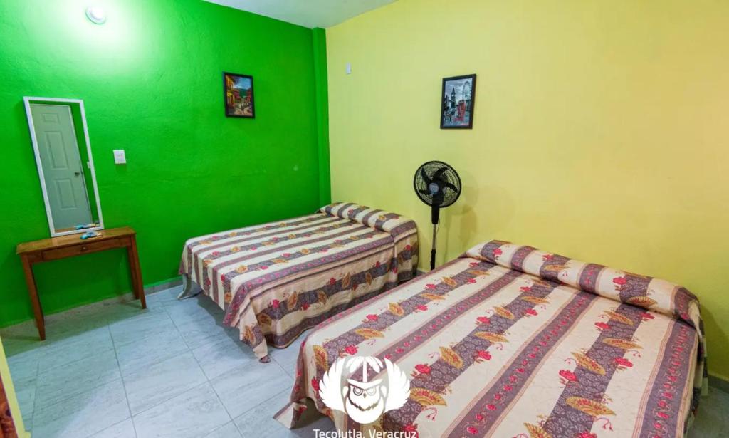 Postel nebo postele na pokoji v ubytování Hotel Villas de Plan